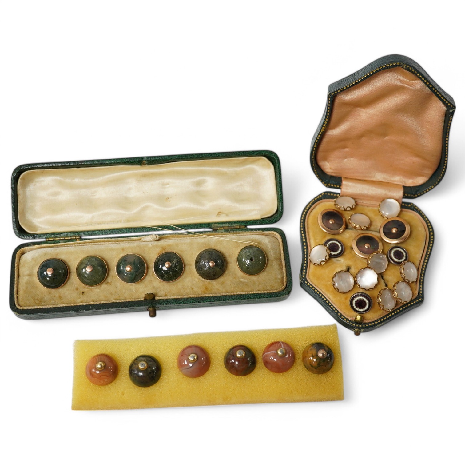 Two sets of 6 Edwardian agate dress studs, three enamelled dress studs, a set of 10 small mother of pearl buttons and three mother of pearl studs. Condition - one gold metal centre to green agate boxed set missing